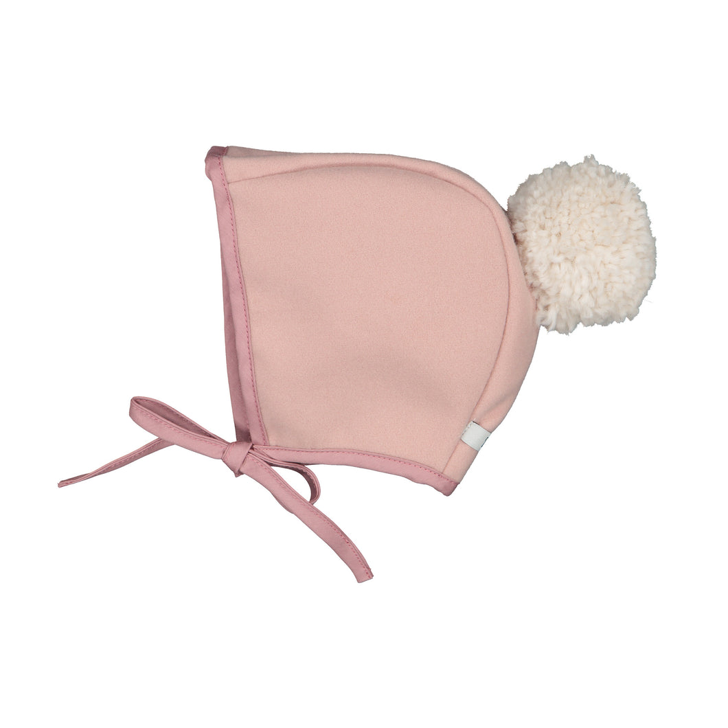 Plush pink bonnet with white bobble